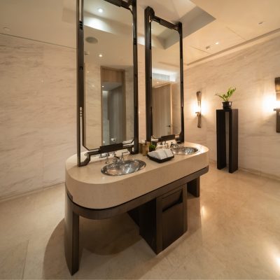 Row of modern marble ceramic wash basin in public toilet, restroom in restaurant or hotel or shopping mall, interior decoration design